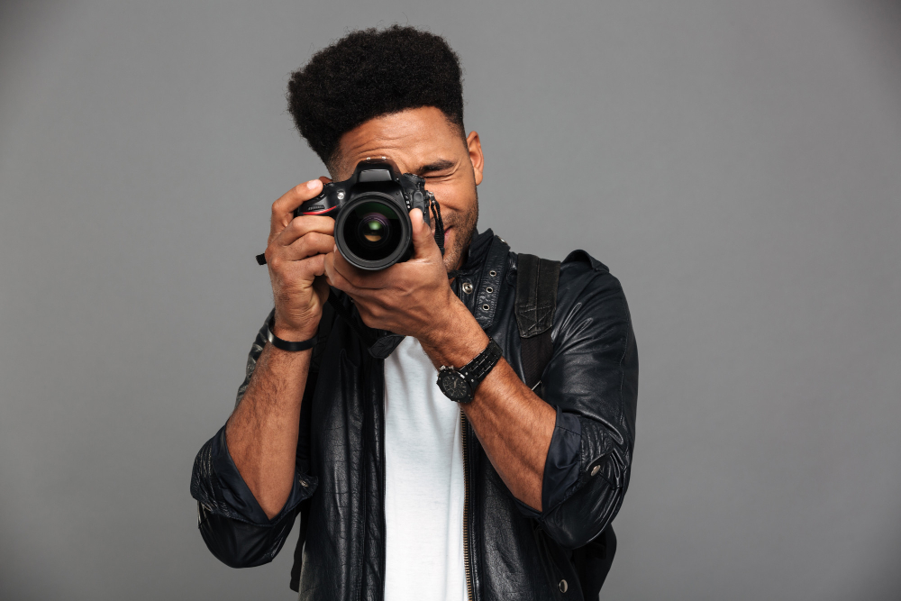 handsome-african-guy-with-stylish-haircut-taking-photo-digital-camera handsome-african-guy-with-stylish-haircut-taking-photo-digital-camera